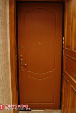 металлическая дверь в квартиру с отделкой из МДФ