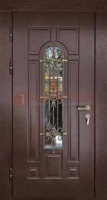 Темная железная дверь со стеклом и ковкой для частного дома ДСК-156 в Орехово-Зуево