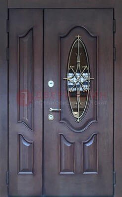 Темная металлическая дверь Винорит со стеклом и ковкой ДСК-239 в Орехово-Зуево