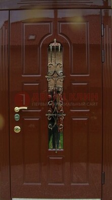 Красивая металлическая дверь со стеклом и ковкой ДСК-33 в Орехово-Зуево