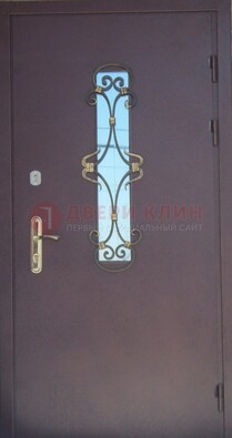 Металлическая дверь со стеклом и ковкой ДСК-77 в Орехово-Зуево